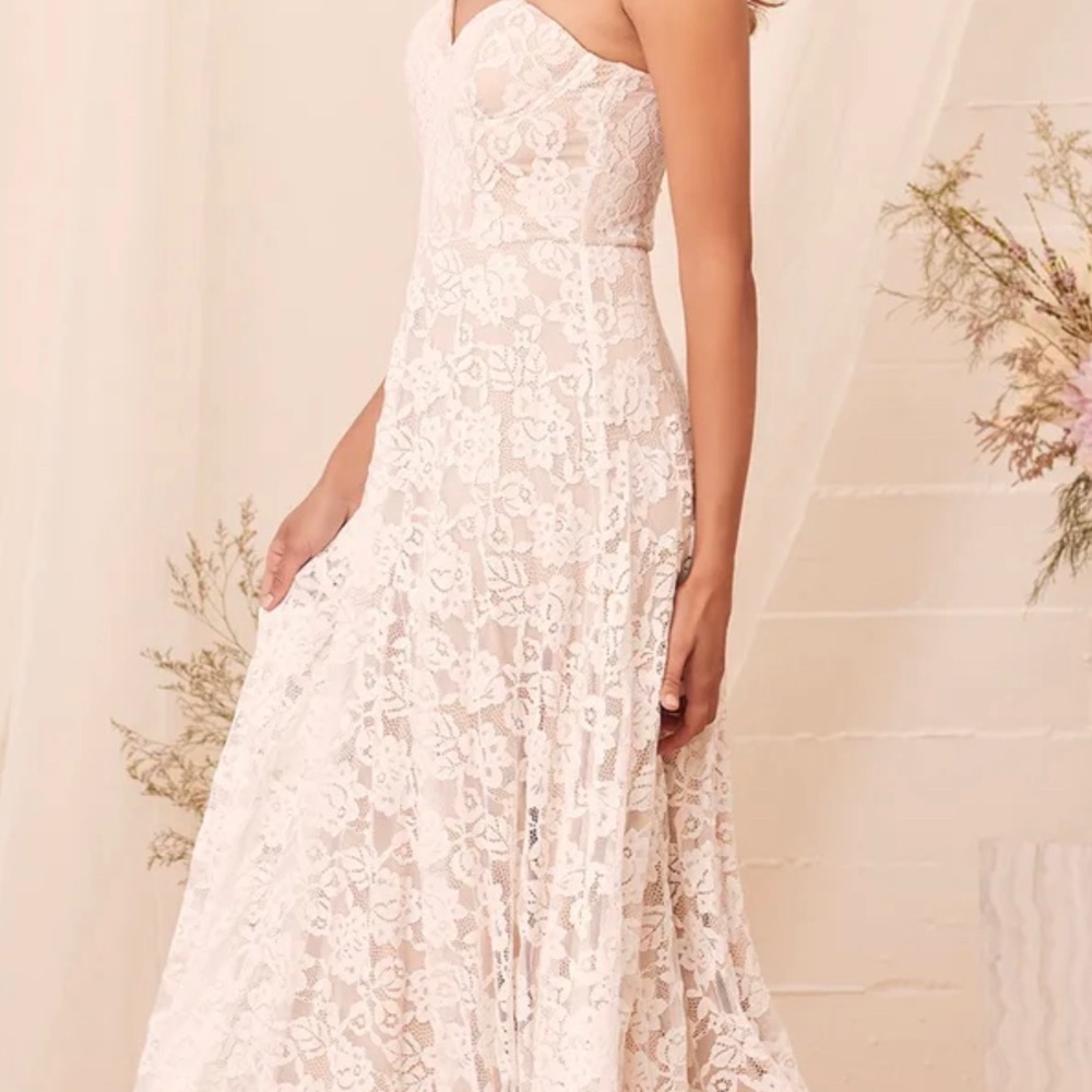 NWT Wedding Gown (Lulu’s) never worn and it comes with garment bag.